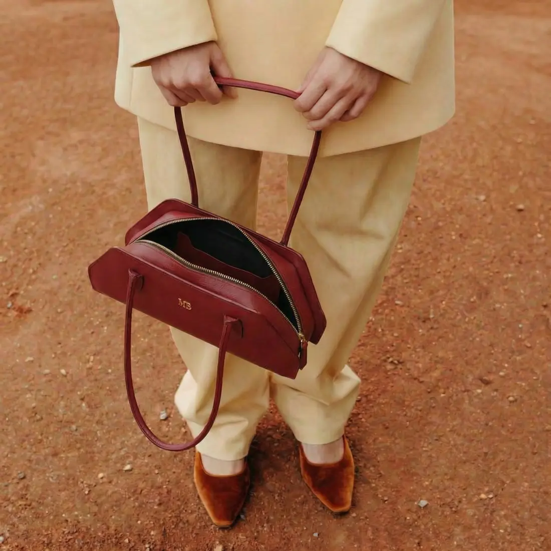 Accessories editorial campaign image, bag held open