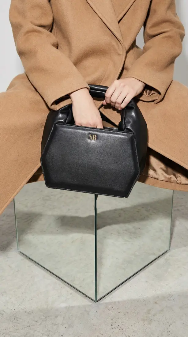 Accessories editorial campaign image, bag in framing